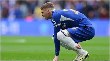 Cole Palmer goes down with an injury during the Emirates FA Cup semi-final match between Manchester City and Chelsea at Wembley Stadium. Photo by James Gill.