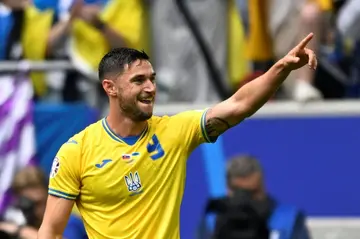 Roman Yaremchuk celebrates after scoring Ukraine's winning goal against Slovakia