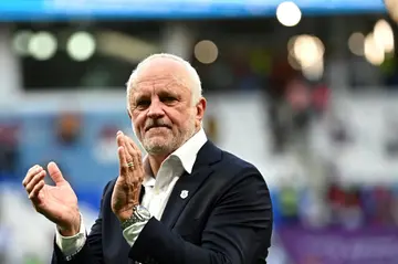 Australia's coach Graham Arnold celebrates the win over Tunisia