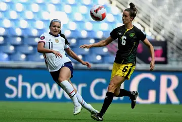The US's Sophia Smith (L) starred with a brace in the 5-0 routing of Jamaica