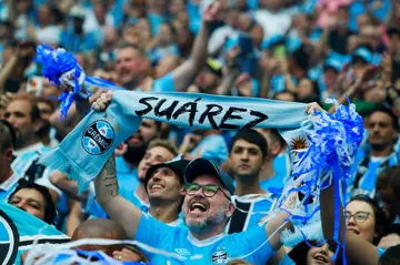 A Gremio fan shows some love for Uruguayan striker Luis Suarez as the club vie for the Rio Grande do Sul state championship in southern Brazil
