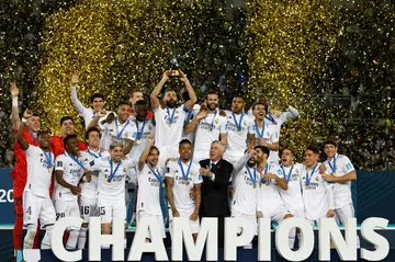 Real Madrid's players celebrate with the trophy after winning the Club World Cup final in Rabat in February