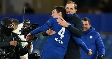 Chelsea's German head coach Thomas Tuchel congratulates Chelsea's Danish defender Andreas Christensen after the UEFA Champions League second leg semi-final football match between Chelsea and Real Madrid (Photo by Glyn KIRK / AFP)
