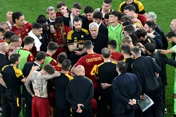 Jose Mourinho (C) has created a deep bond with Roma's players and supporters