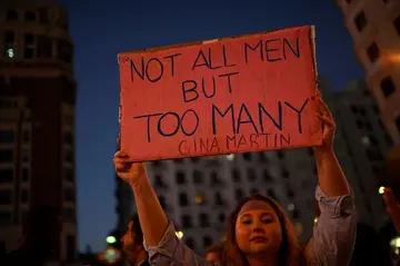 Demonstrators marched through Madrid calling for the football chief's resignation, raising banners denouncing the pervasiveness of male chauvinism