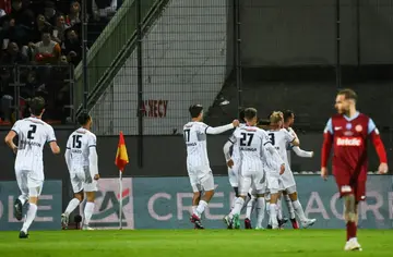 Toulouse celebrate their first goal in the Annecy win