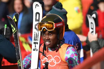 Kenya's Sabrini Simader reacts after competing in the Women's Giant Slalom