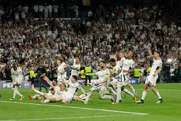 Real Madrid's players celebrate beating Bayern Munich at the Santiago Bernabeu to reach the Champions League final