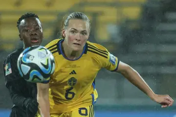 Sweden's Magdalena Eriksson (R) in action in her country's opening Women's World Cup game against South Africa