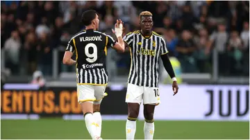 Dusan Vlahovic high-fives his Juventus teammate, Paul Pogba, after scoring to draw level in the Serie A game against Bologna at the Allianz Stadium on August 27, 2023, in Turin, Italy.