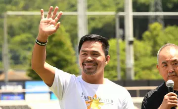 Manny Pacquiao attends the charity marathon event to provide shelters for the children in the Philippines at City Football Station in Tochigi