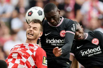 Randal Kolo Muani (C) in action for Eintracht Frankfurt last month