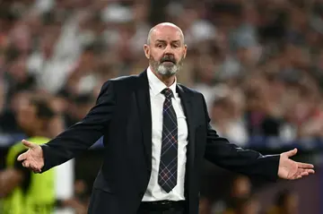 Scotland manager Steve Clarke said he had to "kick backsides" and give a few "cuddles" after a 5-1 defeat to Germany