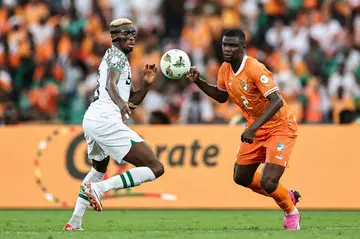 Victor Osimhen (L) in action for Nigeria against hosts Ivory Coast during the group stage