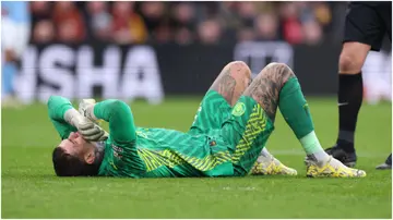 Ederson injured during the Premier League match between Liverpool FC and Manchester City at Anfield. Photo by Alex Livesey.