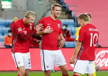 Erling Haaland (L) and Martin Odegaard with Kristoffer Ajer playing for Norway in 2020