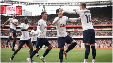 Heung-Min Son celebrates after scoring during the Premier League match between Arsenal FC and Tottenham Hotspur at Emirates Stadium. Photo by Ryan Pierse.