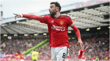 Bruno Fernandes gestures during the Premier League match between Manchester United and Burnley FC at Old Trafford. Photo by Michael Regan.