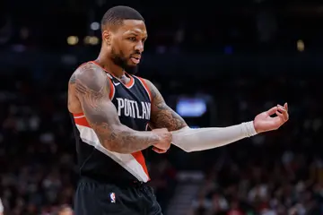 Why do basketball players wear sleeves on one arm?