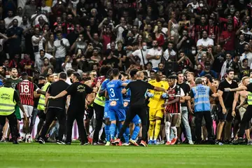 Violence forced the Nice vs Marseille game to be abandoned after fans stoned Dimitri Payet a bottle