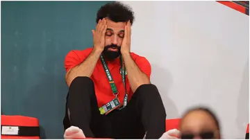 Mohammed Salah gestures as he follows the Africa Cup of Nations Group B match between Cape Verde and Egpyt from the bench at Felix Houphouet Boigny Stadium. Photo by Fareed Kotb.