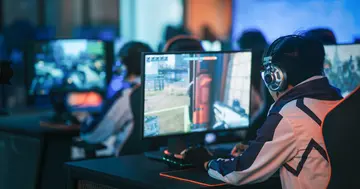Gamers participating in an eSports tournament.