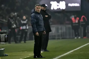 PSG coach Christophe Galtier looks on during his team's defeat by Lyon on Sunday