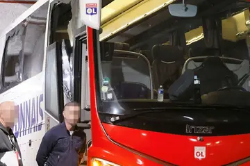 Lyon's team bus after it was stoned as it entered Marseille's Stade Velodrome last Sunday