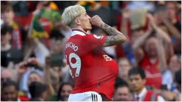 Alejandro Garnacho celebrates after scoring during the Premier League match between Manchester United and Wolves at Old Trafford. Photo by Clive Brunskill.