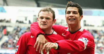 Wayne Rooney and Cristiano Ronaldo (R) celebrate scoring the first goal during a match against Man City on February 13 2005. (Photo by Matthew Peters/Manchester United via Getty Images)