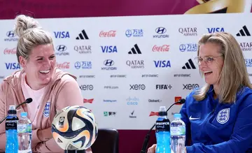 England coach Sarina Wiegman and defender Millie Bright (L) at a press conference ahead of the World Cup final