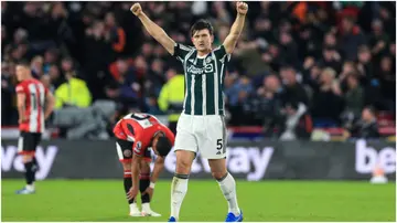 Harry Maguire celebrates during the Premier League match between Sheffield United and Manchester United at Bramall Lane. Photo by Daniel Chesterton.