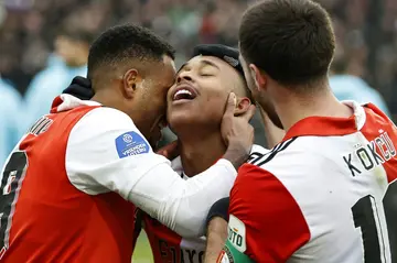 Igor Paixao accepts the congratulations from Feyenoord team-mates after scoring against Ajax