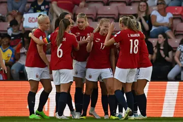 Norway defender Julie Blakstad (C) celebrates with her team-mates