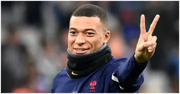 PSG forward Kylian Mbappe waves before the friendly football match between France and Ivory Coast at the Velodrome Stadium. Photo by FRANCK FIFE.