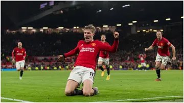 Rasmus Hojlund celebrates after scoring during the Premier League match between Manchester United and Aston Villa at Old Trafford. Photo by Visionhaus.