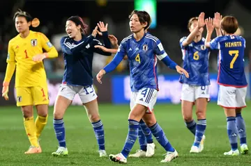 Japan celebrate their win over Costa Rica