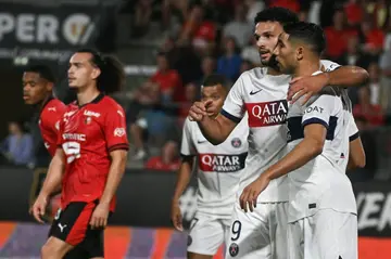 Achraf Hakimi (R) was among the scorers as Paris Saint-Germain won 3-1 in Rennes in Ligue 1