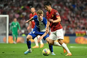 South Korean forward Lee Kang-in (R) has signed for PSG