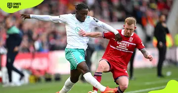 Southampton's FC Kamaldeen Sulemana (left) is challenged by Lewis O'Brien (right) of Middlesbrough during a match at Riverside Stadium on September 23, 2023