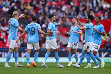 Agbonlahor, Man City, Arsenal, Premier League title.