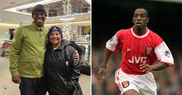 Ian Wright embracing Desiree Ellis.