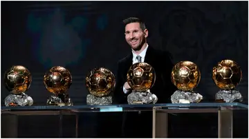 Lionel Messi poses onstage after winning his sixth Ballon D'Or award during the Ballon D'Or Ceremony at Theatre Du Chatelet. Photo by Kristy Sparow.