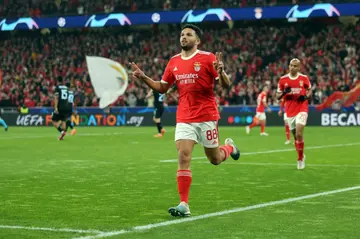 Benfica forward Goncalo Ramos celebrates scoring in his team's romp over Club Brugge in the Champions League last 16