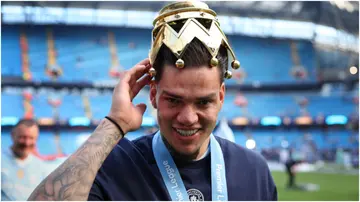 Ederson won his sixth EPL title with Manchester City on Sunday. Photo by Alex Livesey.