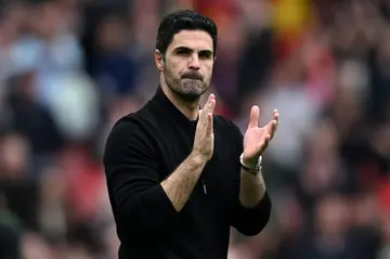 Mikel Arteta's Arsenal are still in the Premier League title race with one game to go