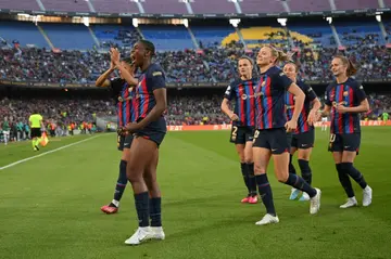 Barcelona players celebrate a goal in their quarter-final win over Roma