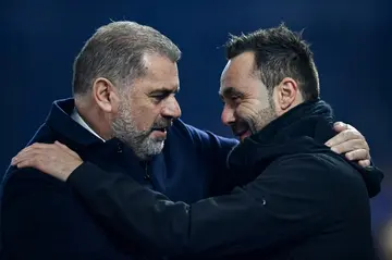 Brighton's Roberto De Zerbi (right) and Tottenham's Ange Postecoglou (left) are contenders to be the new Liverpool manager