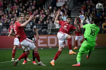 Brendan Chardonnet (L) scoring Brest's opener in their 4-3 win over Metz