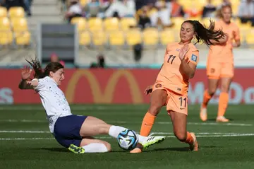 USA midfielder Andi Sullivan (L) challenges Lieke Martens of the Netherlands during the 1-1 draw between the sides on Thursday